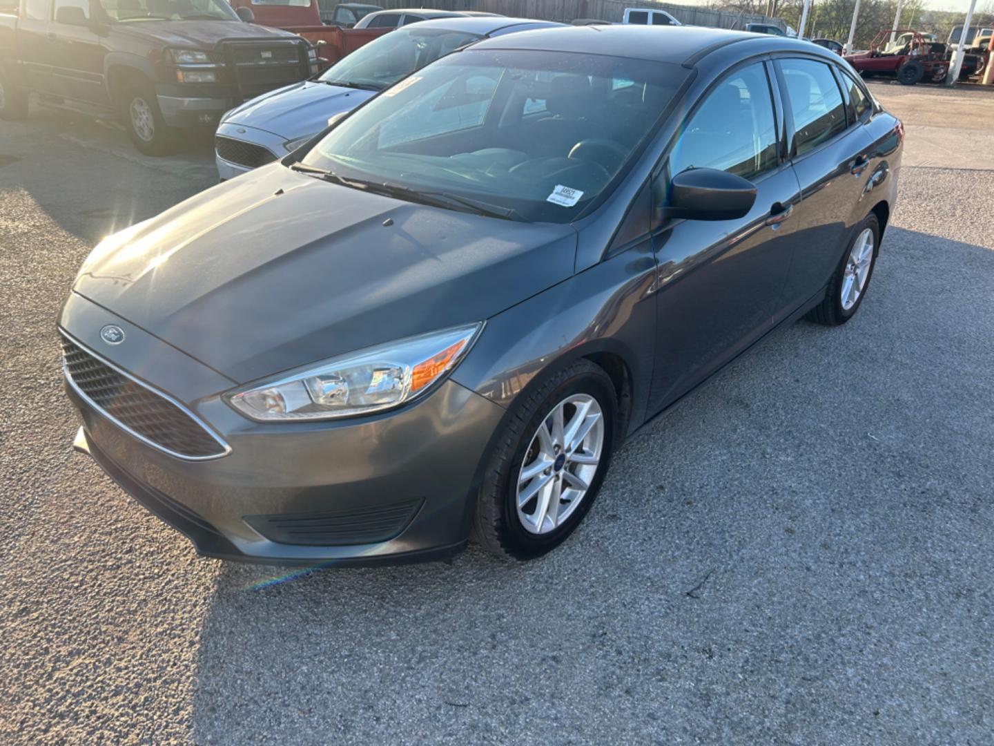 2018 Grey Ford Focus (1FADP3F24JL) , located at 1687 Business 35 S, New Braunfels, TX, 78130, (830) 625-7159, 29.655487, -98.051491 - Photo#0